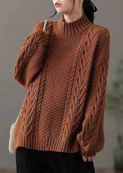 Jersey ligero con cuello alto y corte oversize para un look primaveral