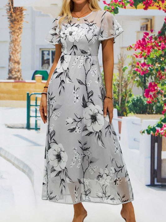 Vestido con estampado floral y escote redondo