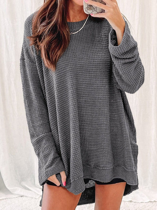 Jersey oversize con mangas largas y aberturas laterales