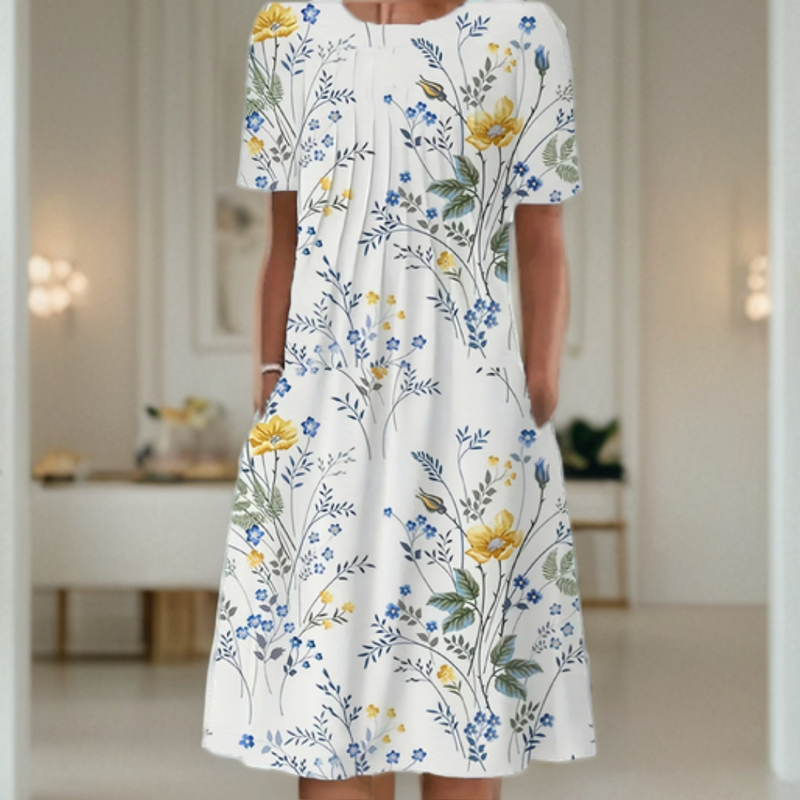 Vestido ancho con cuello redondo, manga tres cuartos y estampado