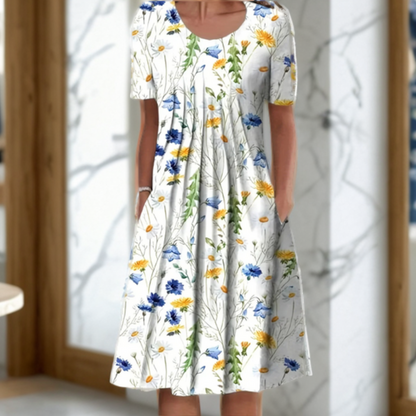 Vestido ancho con cuello redondo, manga tres cuartos y estampado