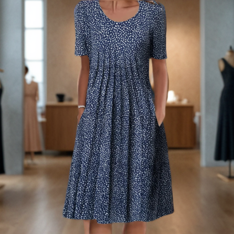Vestido ancho con cuello redondo, manga tres cuartos y estampado