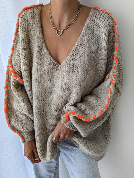 Jersey oversize estampado de mujer con cuello en V profundo | Una opción a la moda para los días fríos