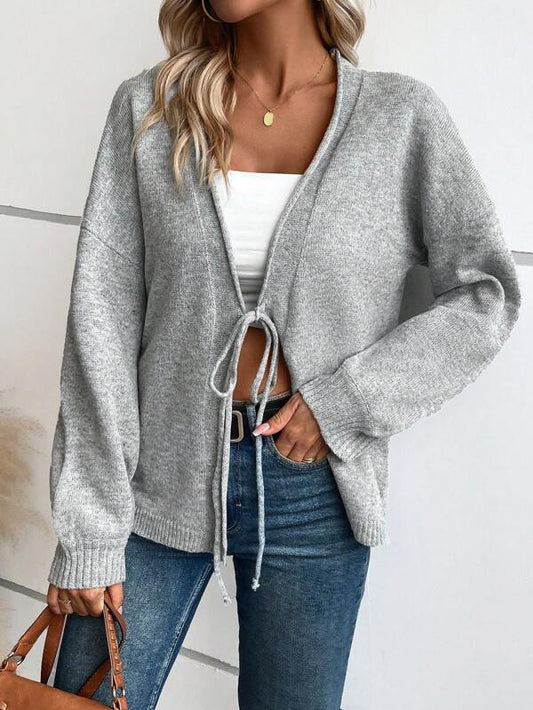 Elegante jersey de manga larga con cordones