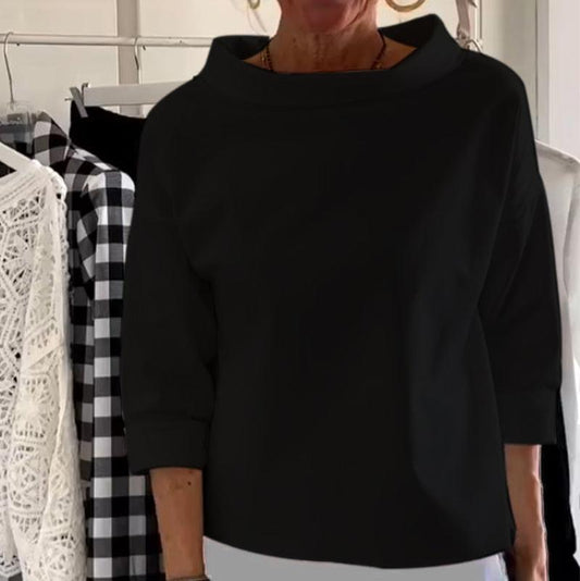 Elegante top con cuello alto para mujer