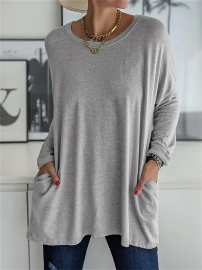 Blusa holgada con bolsillo para looks de diario