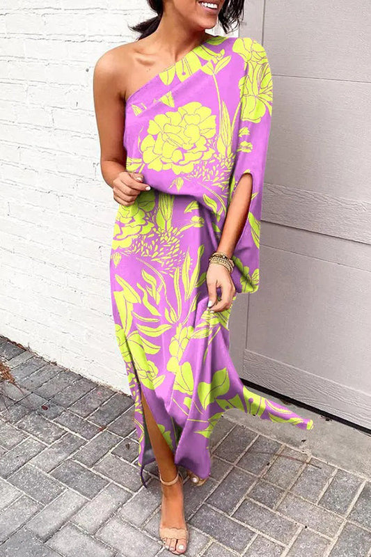 Vestido largo asimétrico con elegante estampado y abertura lateral