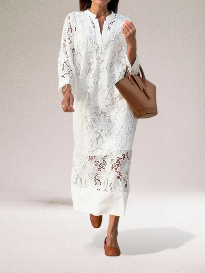 Elegante vestido largo con detalles calados de inspiración clásica