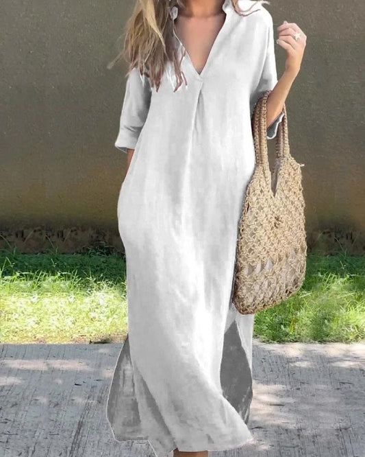 Vestido casual largo para mujer con mangas a media pierna y diseño relajado.
