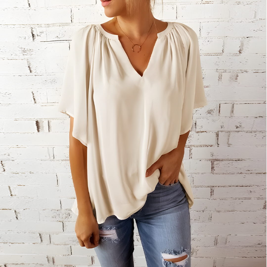 Tineke - Blusa elegante de mujer con cuello en V