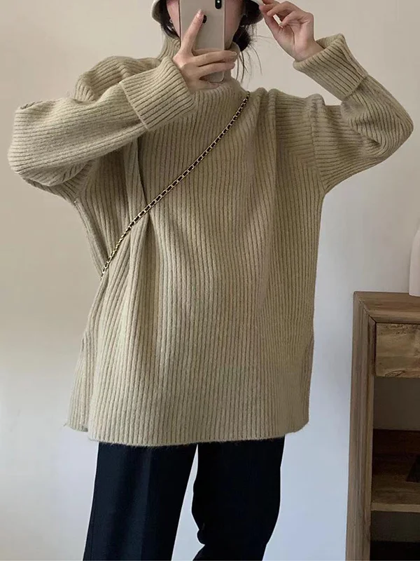Elegante jersey de manga larga y aberturas laterales