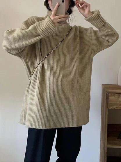 Elegante jersey de manga larga y aberturas laterales