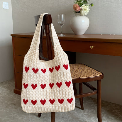 Nina | Bolso de punto con estampado de corazones hecho a mano