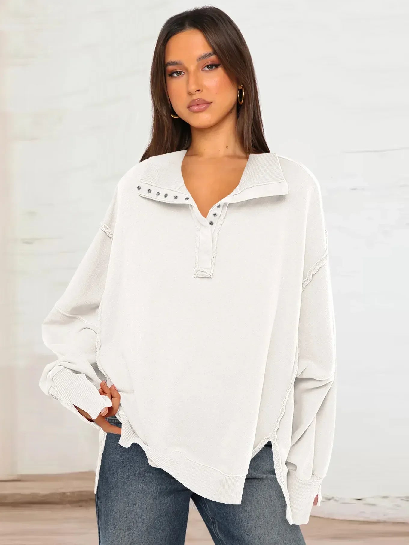 Mela | Sudadera informal con solapa, botones y mangas farolillo