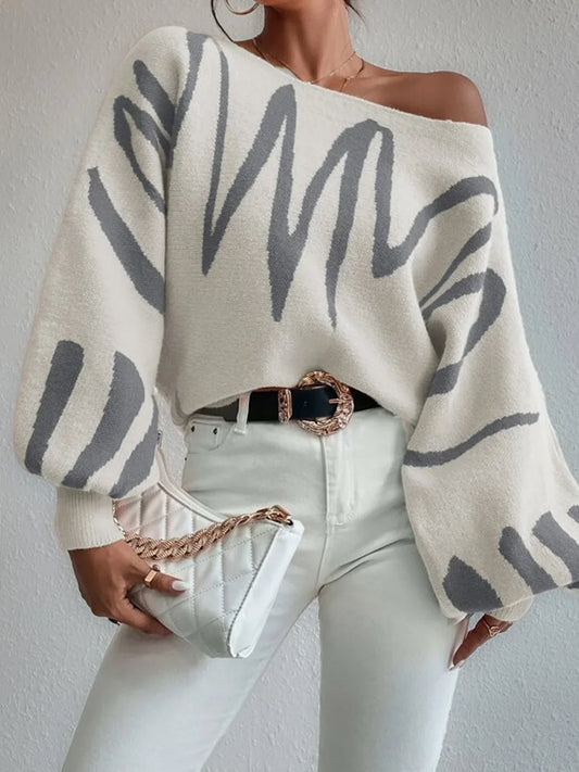 Elegante jersey de manga abullonada y cuello barco con rayas abstractas para la moda urbana