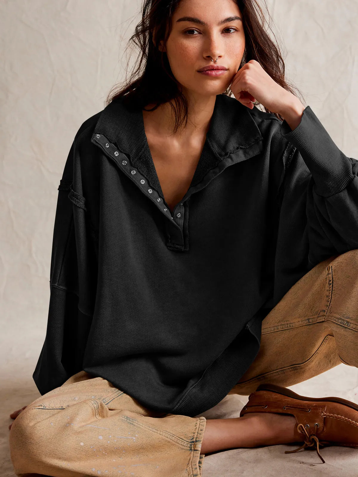 Mela | Sudadera informal con solapa, botones y mangas farolillo