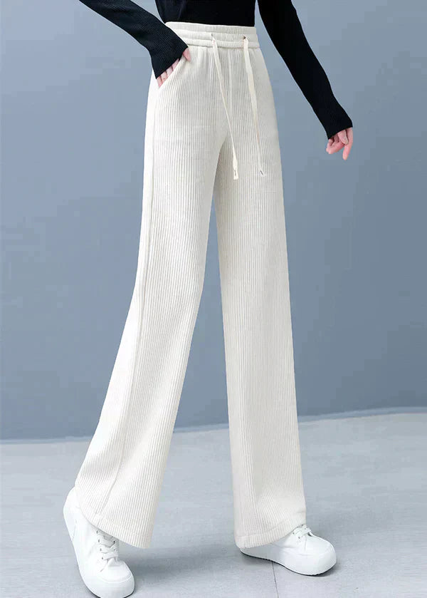 Pantalones lisos de corte recto con perneras anchas