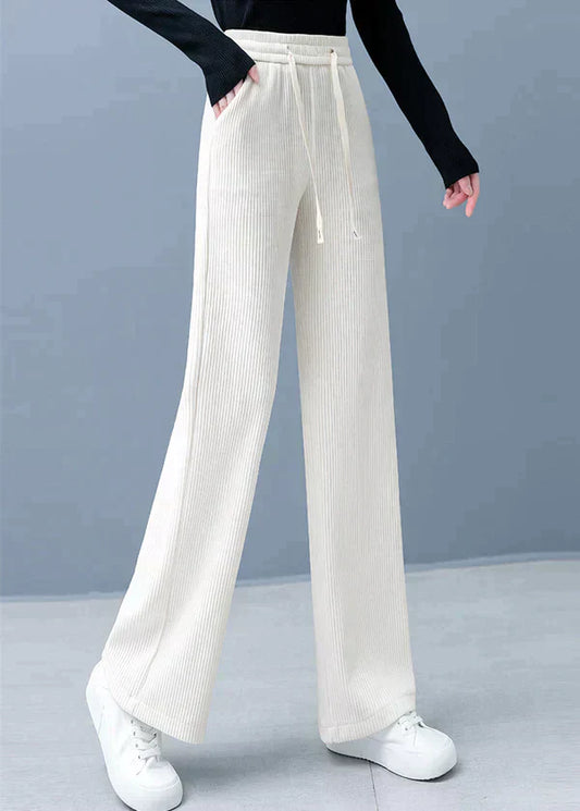 Pantalones lisos de corte recto con perneras anchas