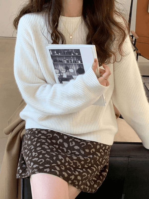 Un jersey de cuello redondo versátil, elegante y cómodo para el día a día