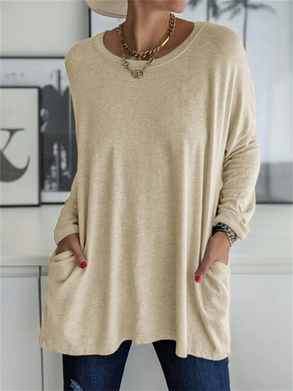 Blusa holgada con bolsillo para looks de diario