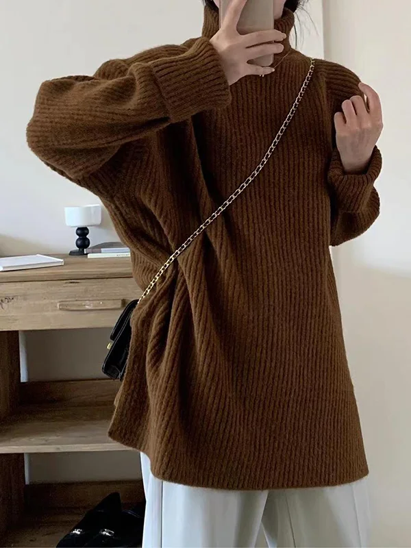 Elegante jersey de manga larga y aberturas laterales