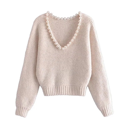 Angèle | Jersey chic y desenfadado con perlas de imitación