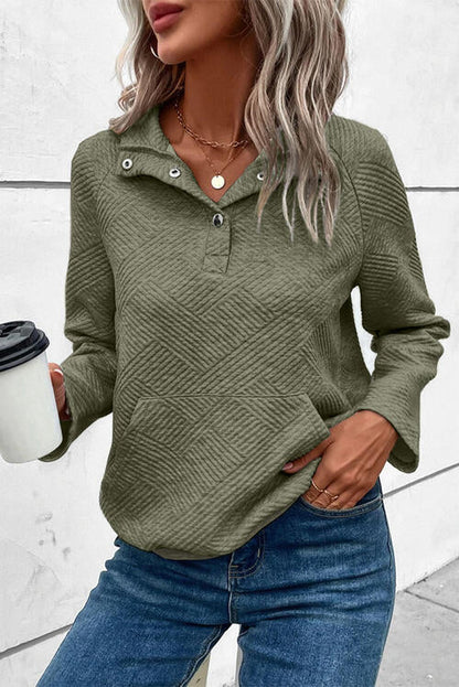 Elegante jersey que destaca por su discreta sencillez
