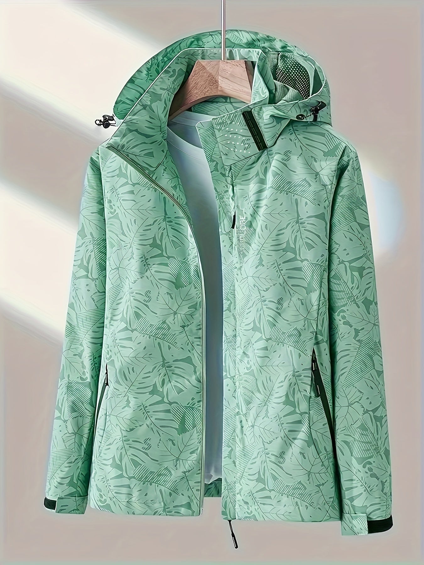 CALSEY | CORTAVIENTOS IMPERMEABLE CON ESTAMPADO DE CAMUFLAJE