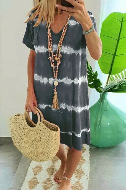 Vestido camisero de rayas con mangas cortas y corte holgado