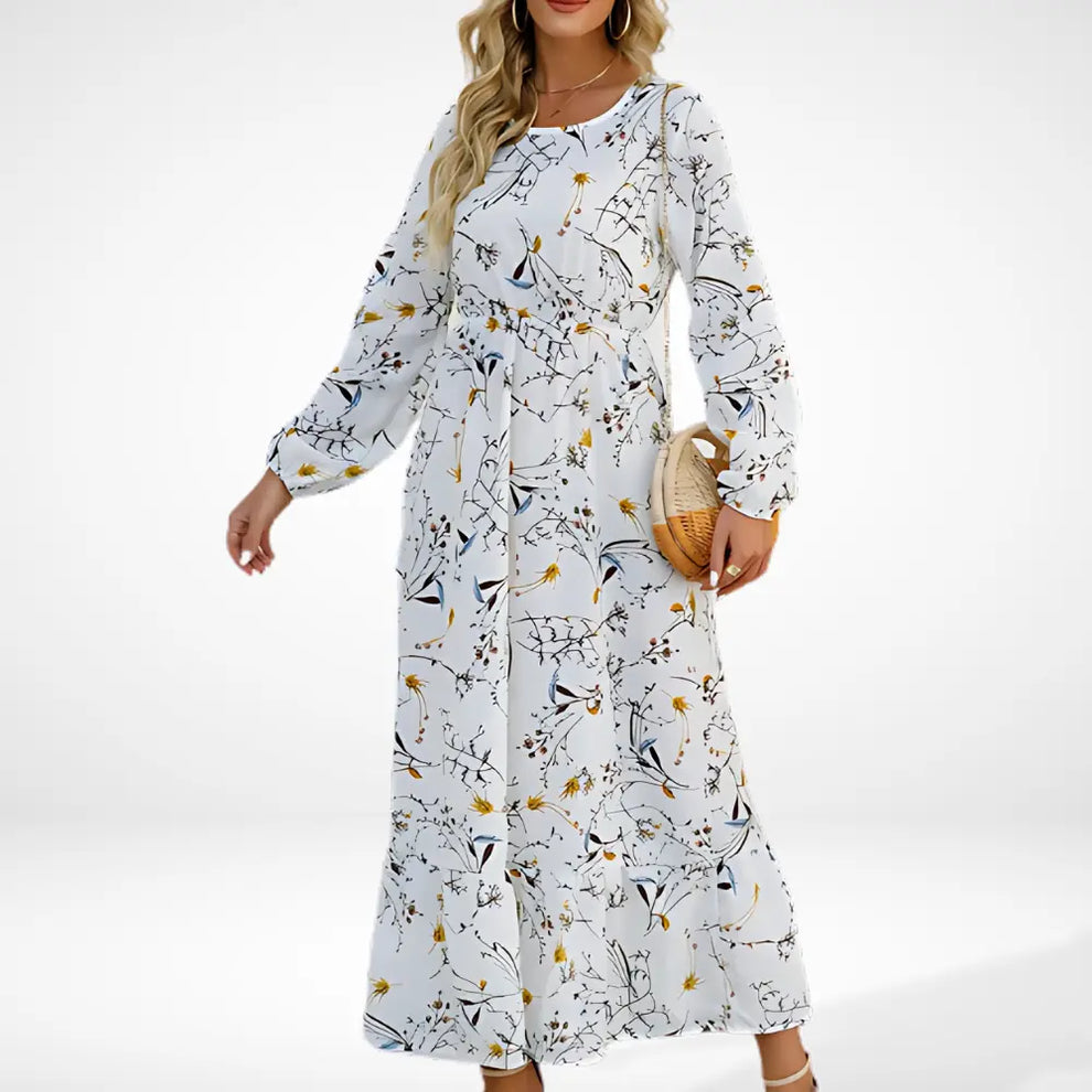 Vestido largo suelto con estampado floral y mangas largas