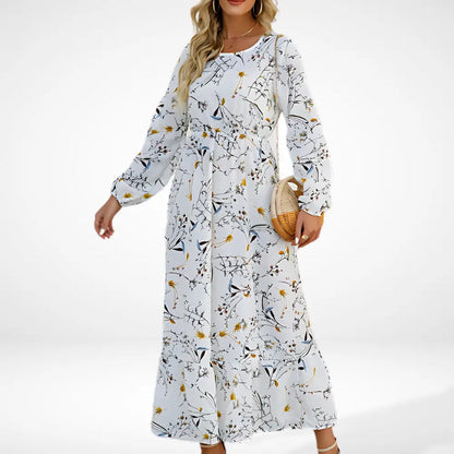 Vestido largo suelto con estampado floral y mangas largas