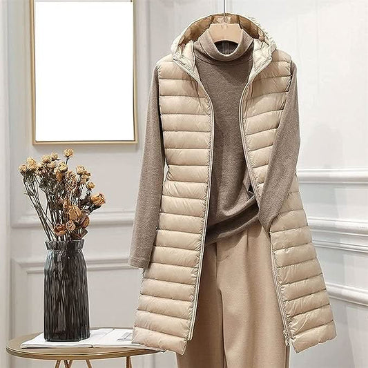 Elegante chaleco de plumón con capucha y corte largo para mujer
