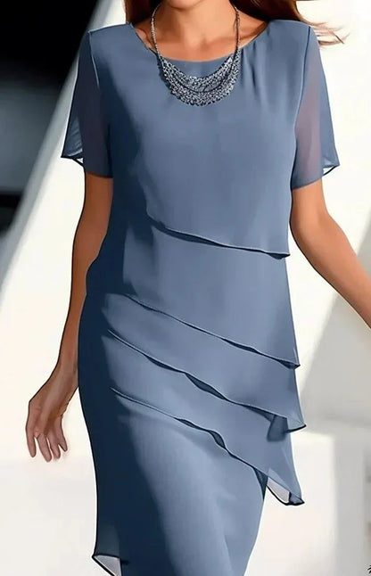 Vestido elegante con pliegues y ligereza