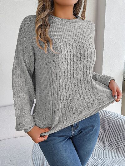 Elegante jersey con estampado tejido y delicados detalles de perlas