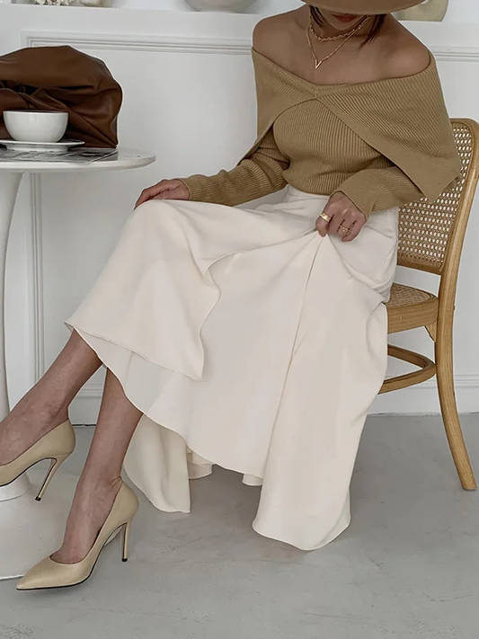 Elegante jersey con efecto de hombros al aire