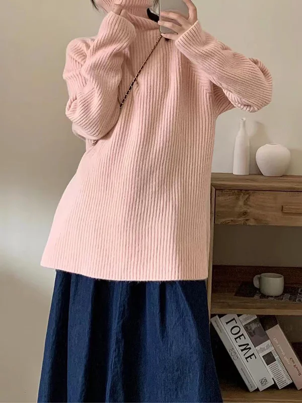Elegante jersey de manga larga y aberturas laterales