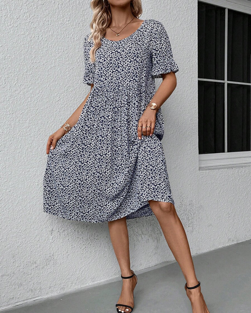 Elegante vestido corto de manga corta con delicado estampado floral