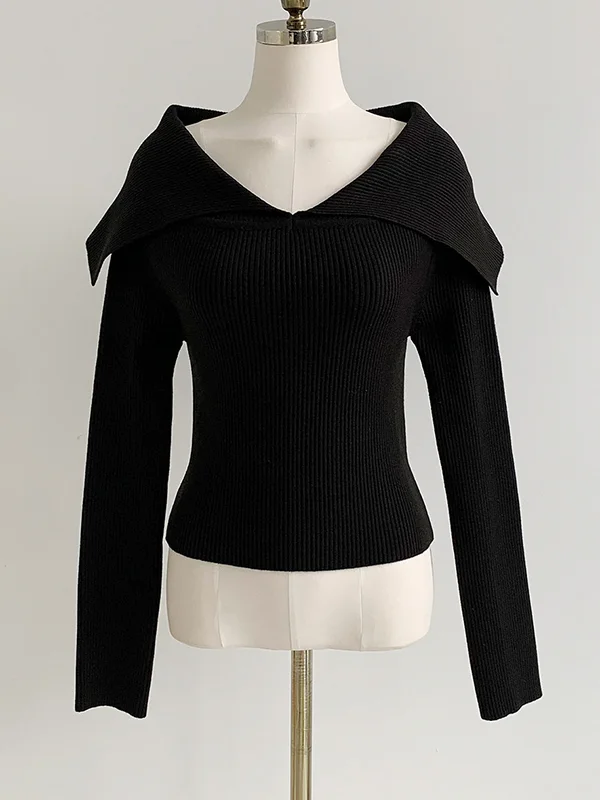 Elegante jersey con efecto de hombros al aire
