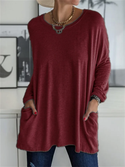 Blusa holgada con bolsillo para looks de diario