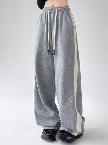 Pantalón de chándal de pernera ancha con cordón y ribete de contraste