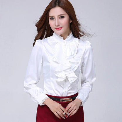 Suzette Bloes | Blusa con volantes y mangas largas