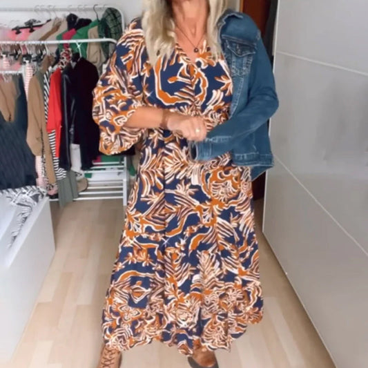 Vestido largo con estampado y escote clásico