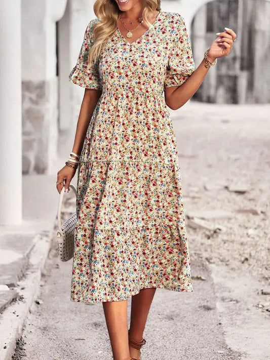 Vestido elegante con mangas cortas y escote en V