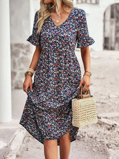 Vestido elegante con mangas cortas y escote en V
