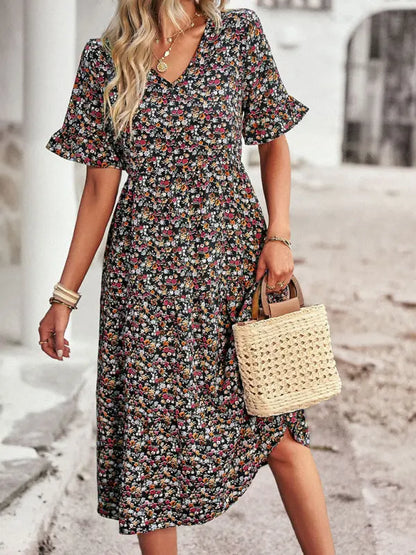 Vestido elegante con mangas cortas y escote en V