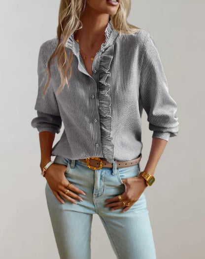 Ciara - Elegante blusa de manga larga con volantes