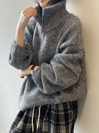 Suave jersey de cuello alto con media cremallera para mujer