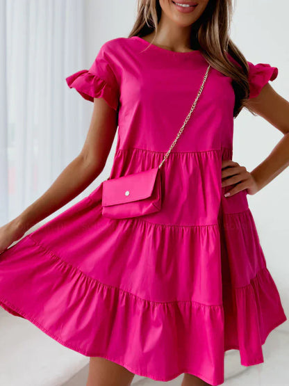Vestidos con mangas anchas y escote redondo y dobladillo irregular