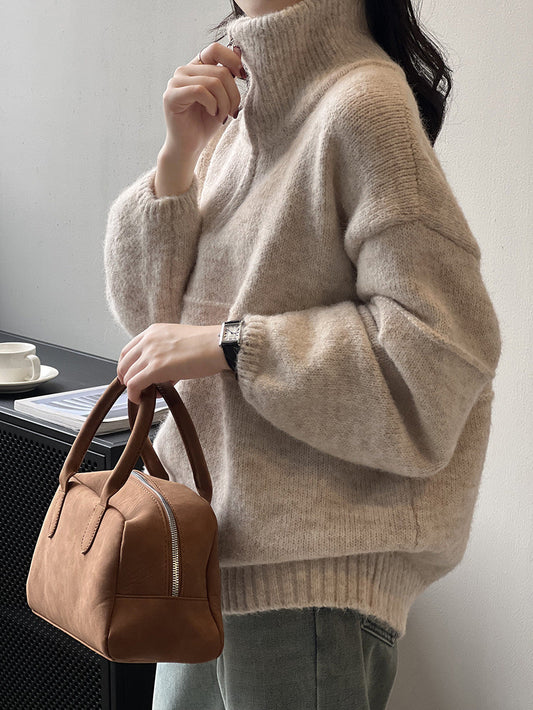 Suave jersey de cuello alto con media cremallera para mujer