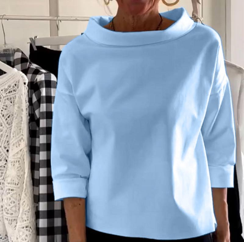 Elegante top con cuello alto para mujer